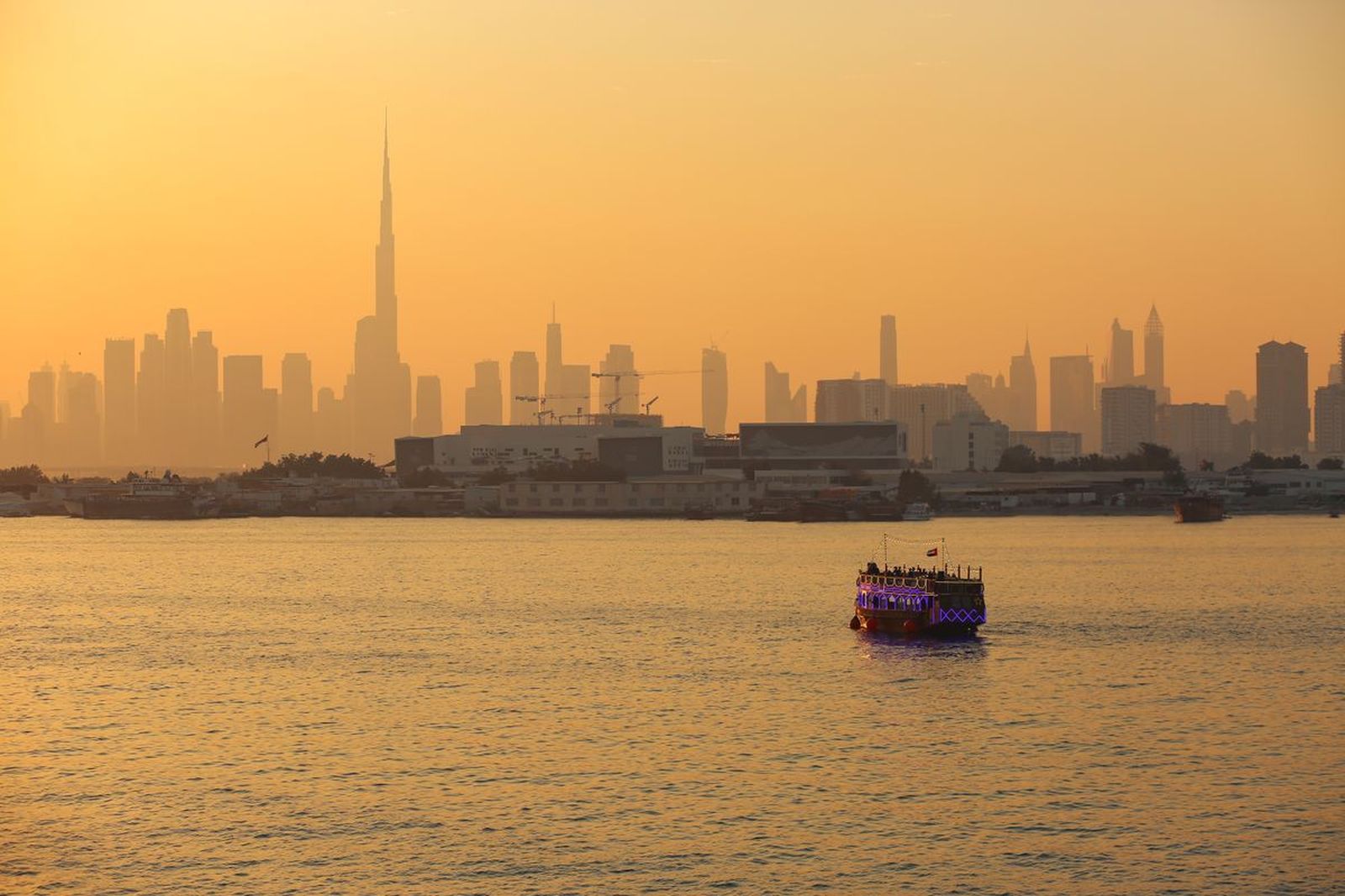 Dubai skyline at dusk over Dubai Creek